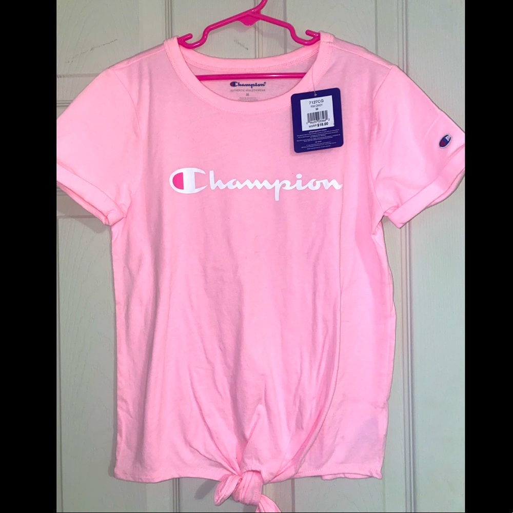Pink Candy size M TShirt with a small knot at the bottom. Brand new with tags